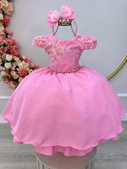 Vestido de dama de honor de encaje rosa chicle con perlas y tiara