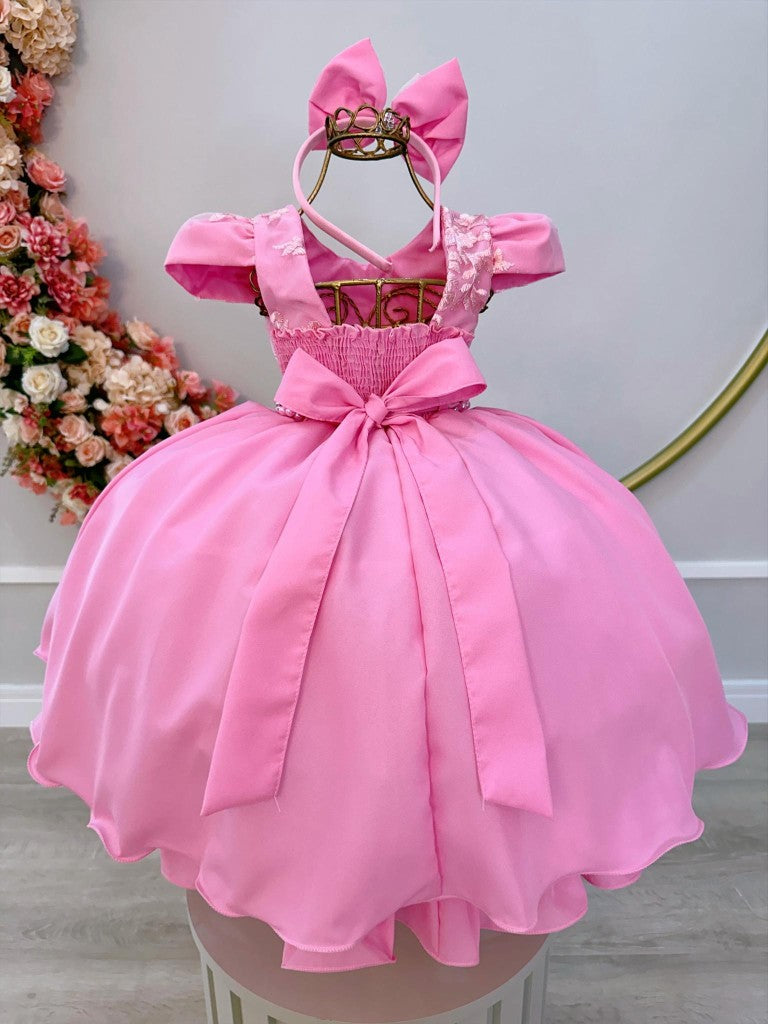 Vestido de dama de honor de encaje rosa chicle con perlas y tiara