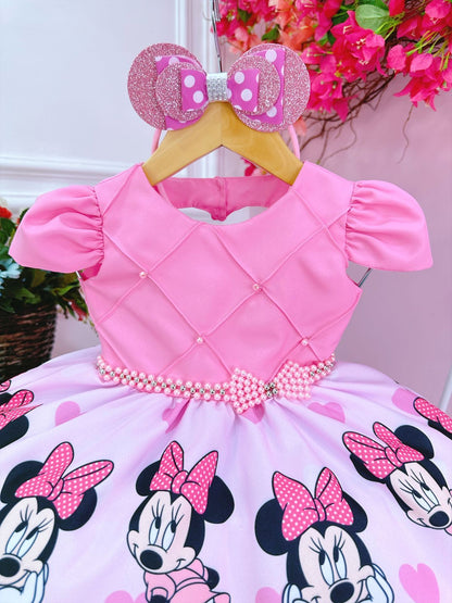 Vestido infantil de Minnie Mouse rosa con cinturón de perlas y tiara
