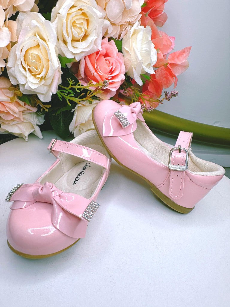 Zapatos de charol rosa con lazo y aplique de diamantes de imitación 