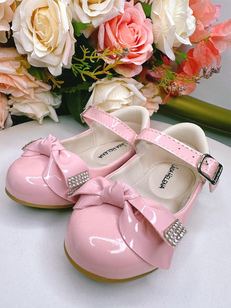 Zapatos de charol rosa con lazo y aplique de diamantes de imitación 