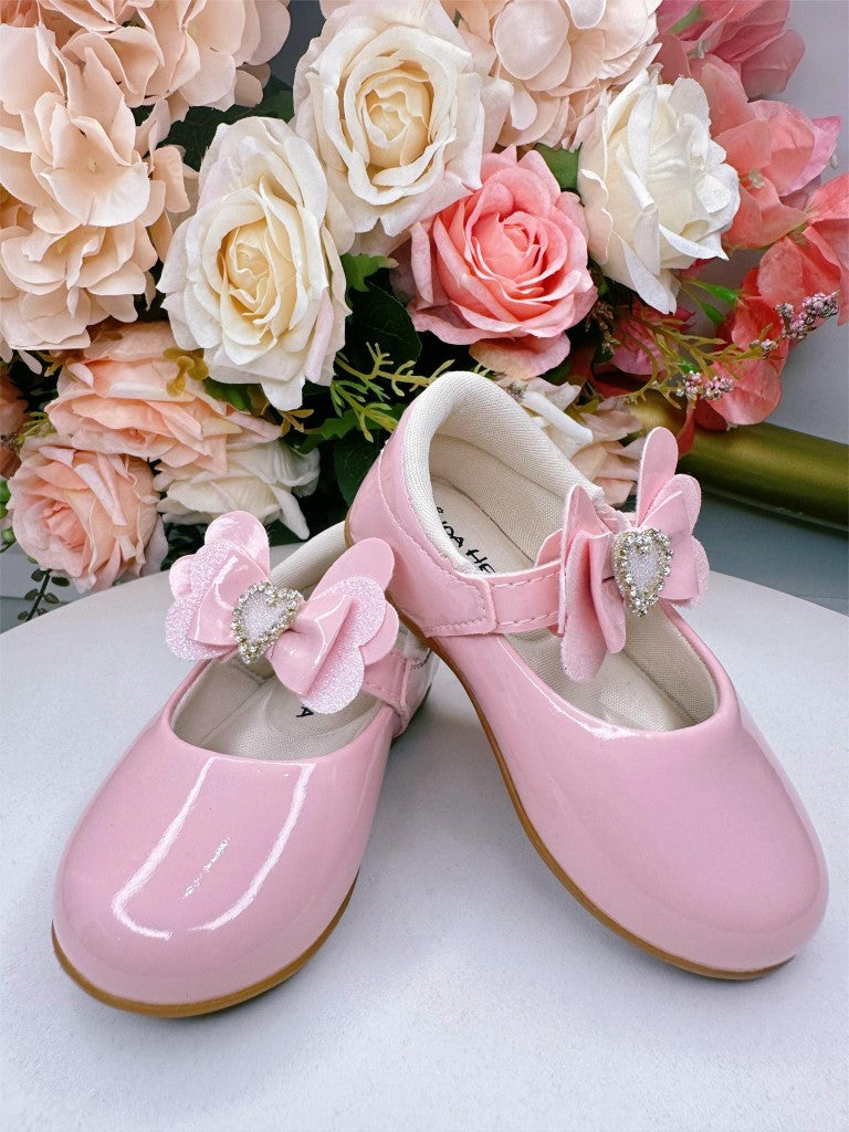 Zapatos rosa bebé con aplique de corazón de diamantes de imitación