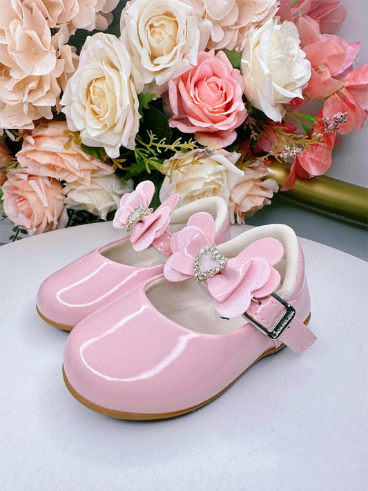 Zapatos rosa bebé con aplique de corazón de diamantes de imitación