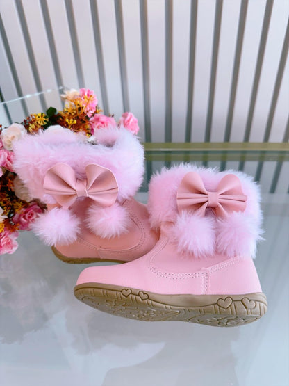 Botitas infantiles rosas con lazo de pompón, peluche y cremallera 
