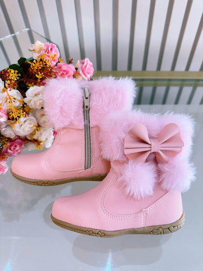 Botitas infantiles rosas con lazo de pompón, peluche y cremallera 