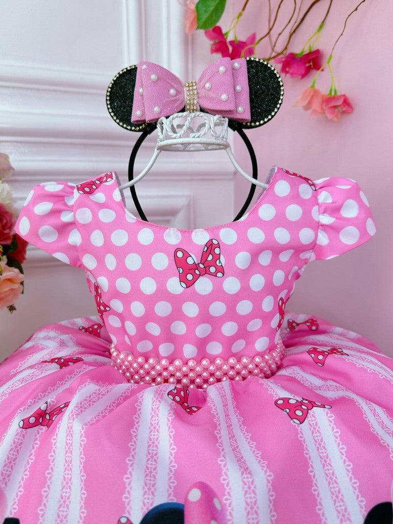 Vestido rosa de Minnie Mouse con cinturón de perlas y princesas de lunares