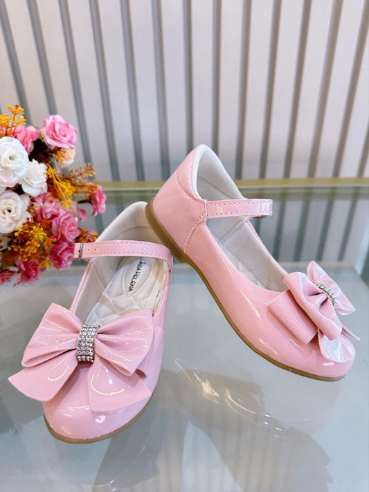 Zapatos de charol rosa de lujo con lazo y pedrería 