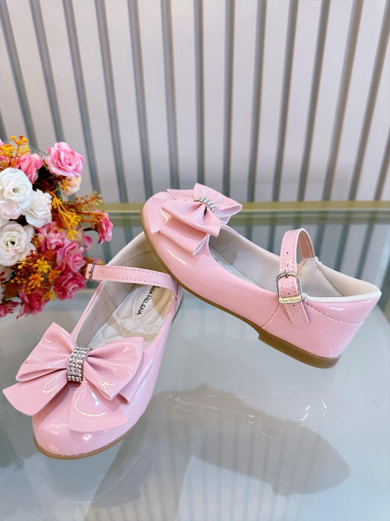 Zapatos de charol rosa de lujo con lazo y pedrería 