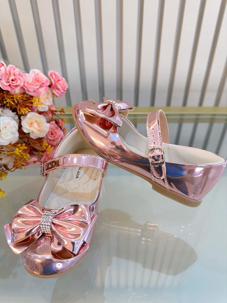 Zapato rosa metalizado de lujo con lazo y pedrería 