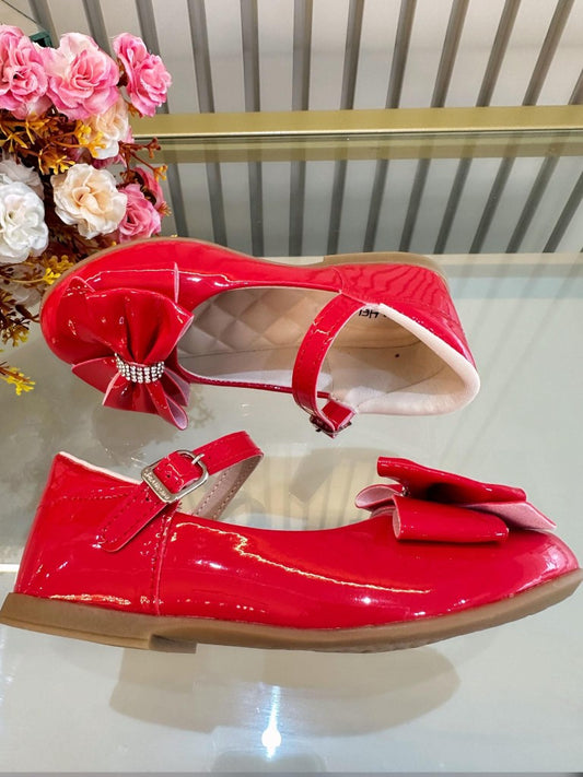Zapatos de charol rojo de lujo con lazo y pedrería 
