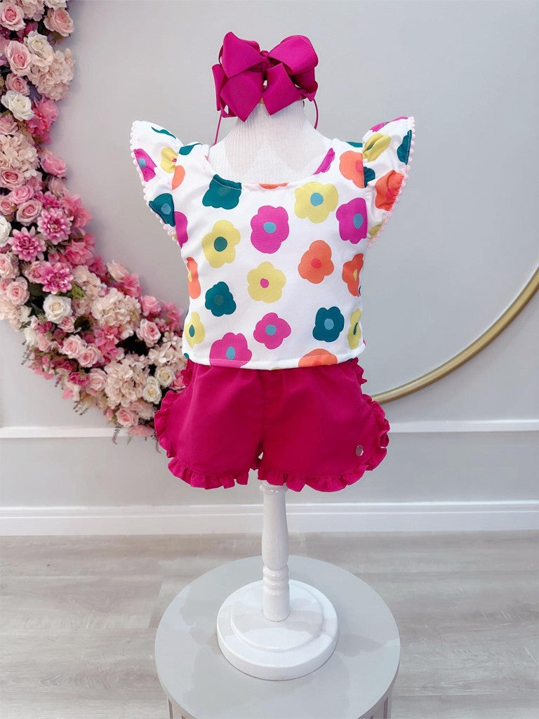 Conjunto floral blanco para niña con pantalón corto rosa y pulsera