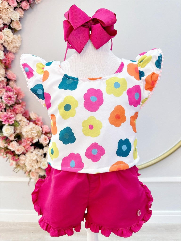 Conjunto floral blanco para niña con pantalón corto rosa y pulsera