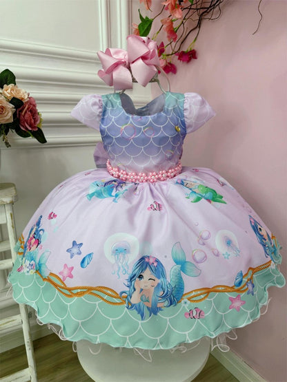 Vestido de sirena rosa y lila con escamas y cinturón de perlas 