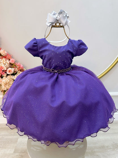 Vestido infantil morado con busto de pedrería y falda con purpurina