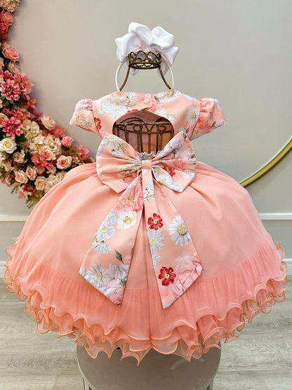 Vestido infantil color salmón y falda con volantes y busto de flores con pedrería