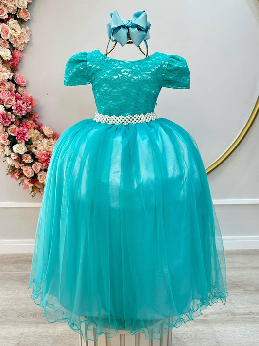 Vestido largo de tul con encaje verde para niña, ideal para dama de honor en una boda de lujo.