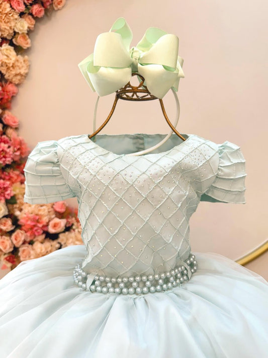 Vestido infantil verde claro con pedrería y busto acanalado