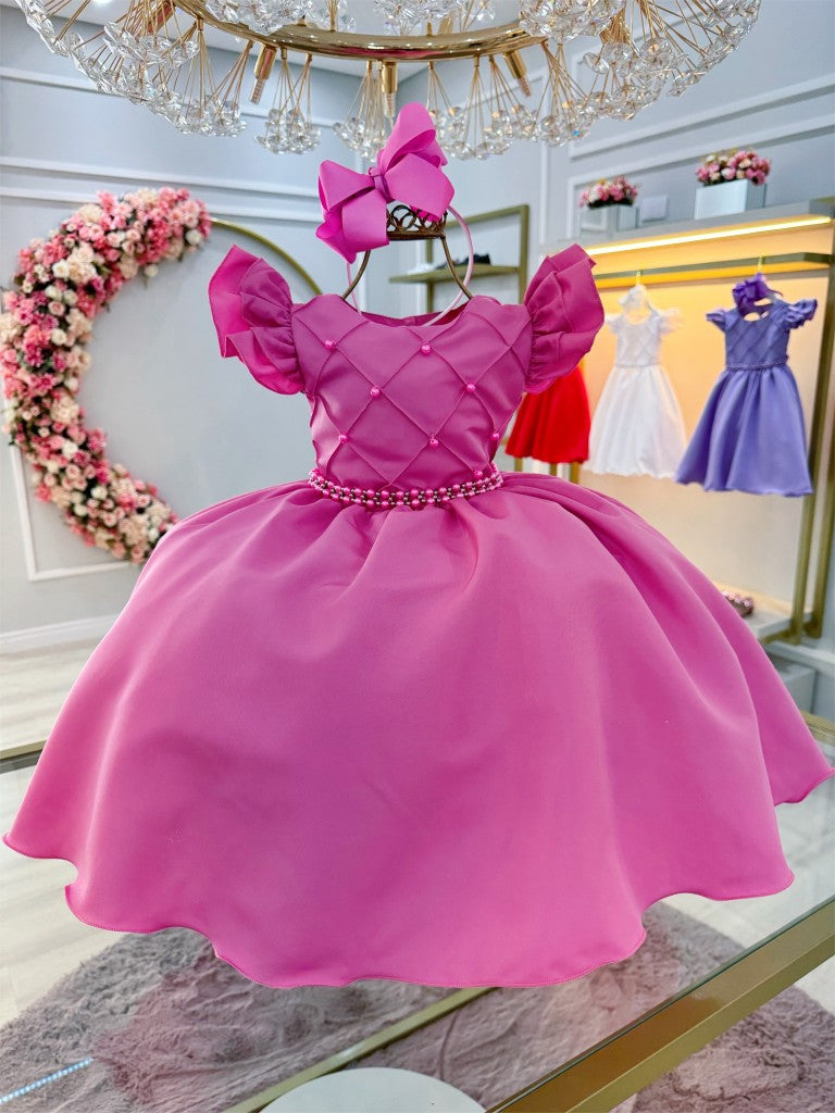 Vestido infantil rosa chicle con perlas y busto acanalado