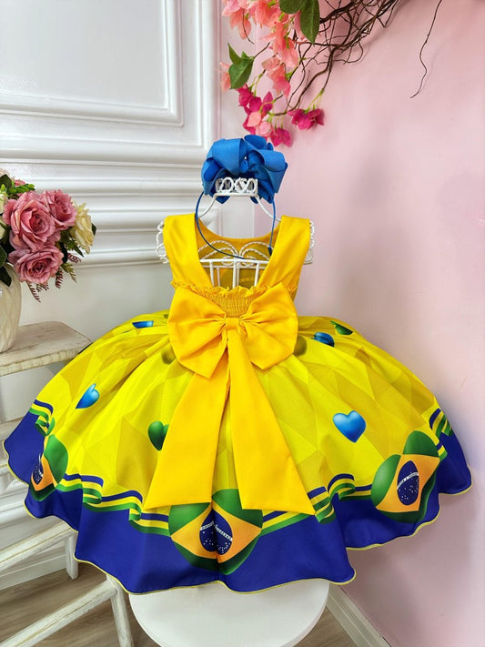 Vestido infantil con temática brasileña en amarillo y azul y perlas