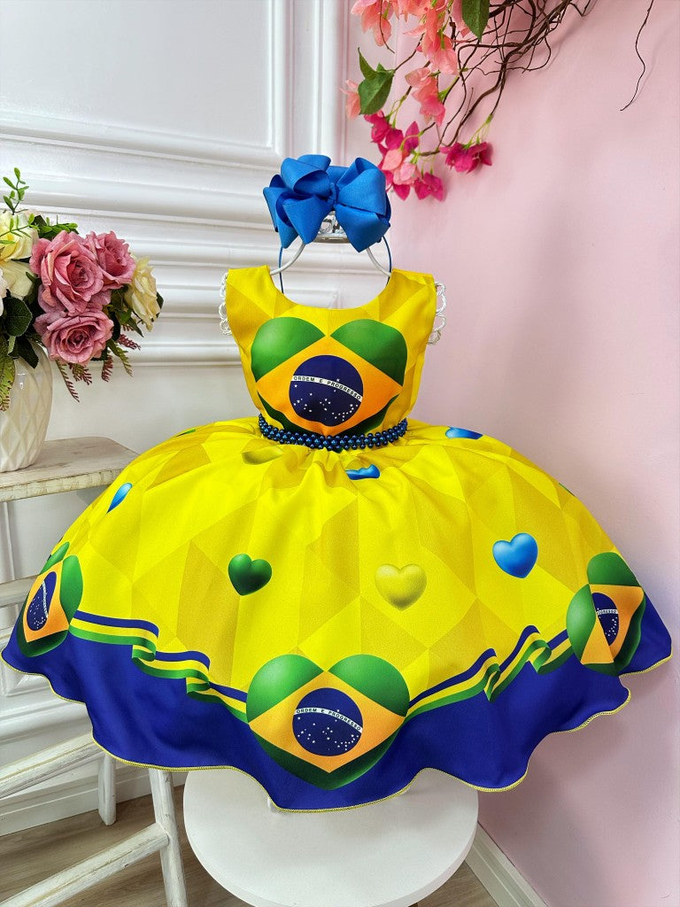 Vestido infantil con temática brasileña en amarillo y azul y perlas