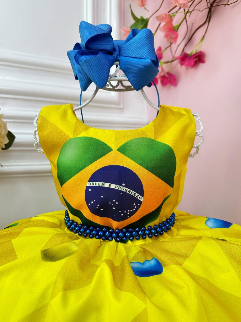 Vestido infantil con temática brasileña en amarillo y azul y perlas