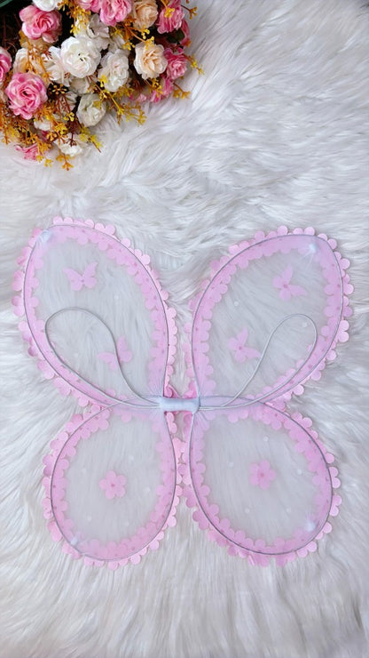 Hada rosa del jardín encantado con alas de mariposa