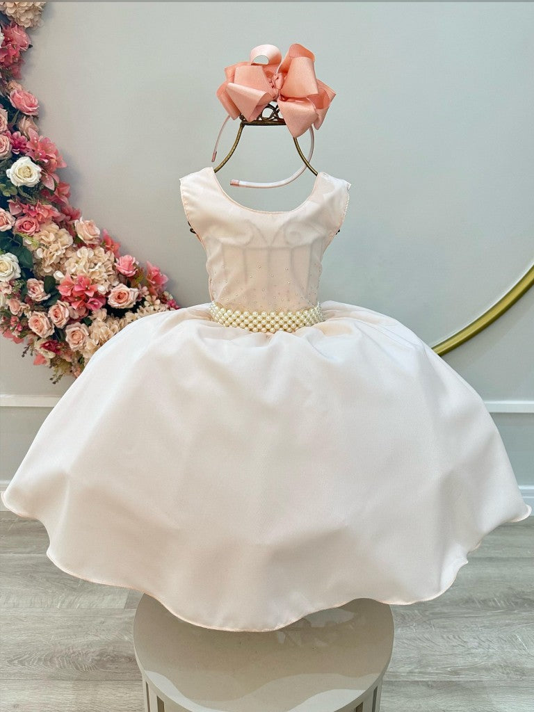 Vestido infantil color salmón claro con pedrería en el busto para damas de honor