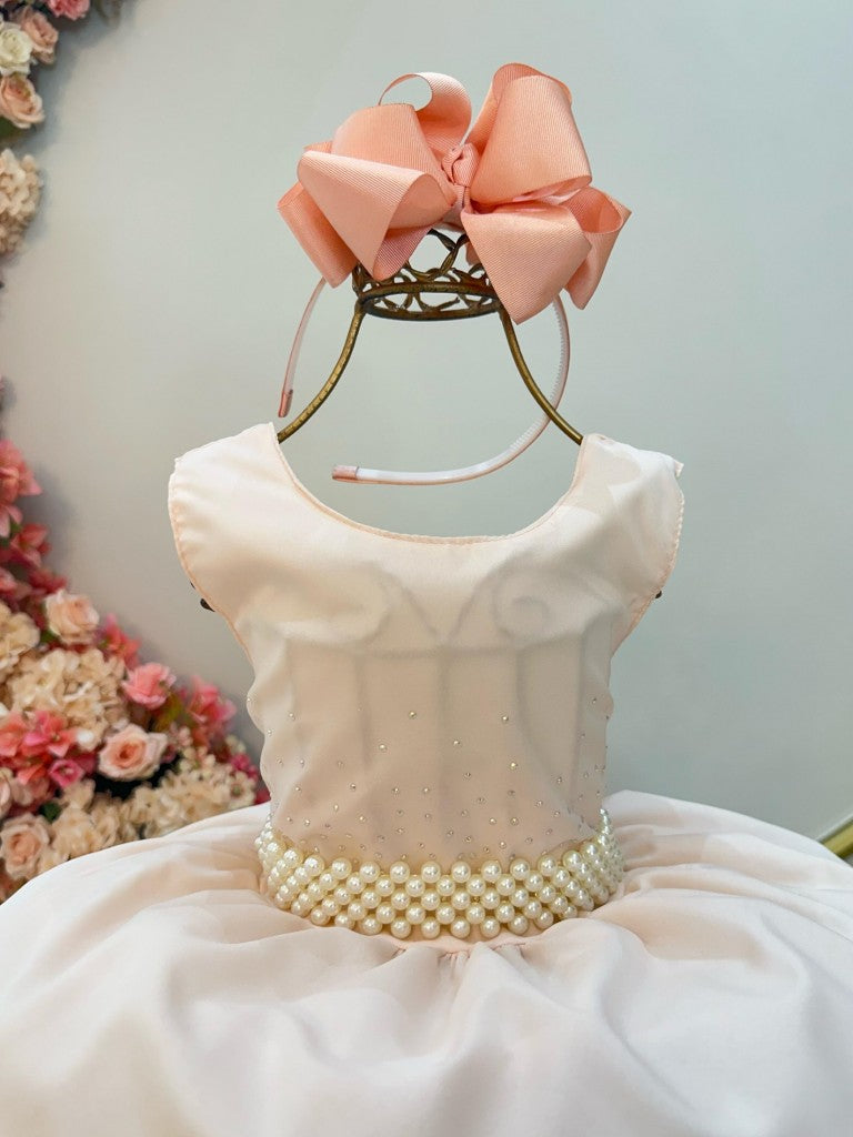 Vestido infantil color salmón claro con pedrería en el busto para damas de honor