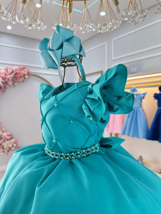 Vestido infantil verde con perlas y busto acanalado para fiestas