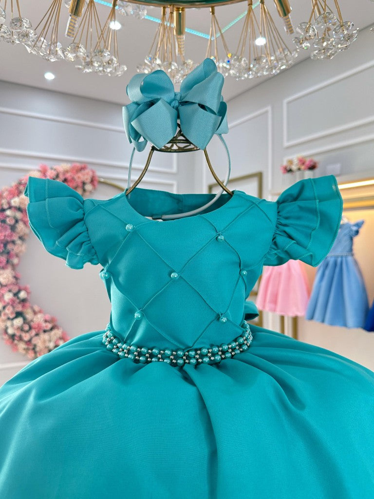 Vestido infantil verde con perlas y busto acanalado para fiestas