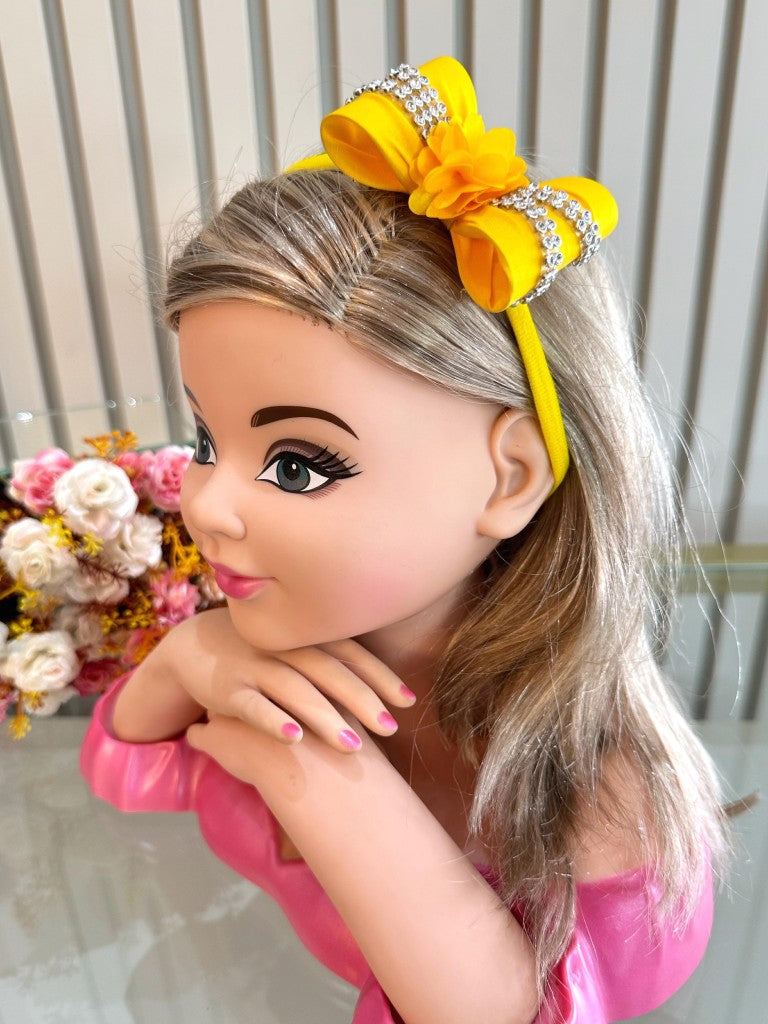 Diadema para bebé con lazo de flores y pedrería en varios colores 