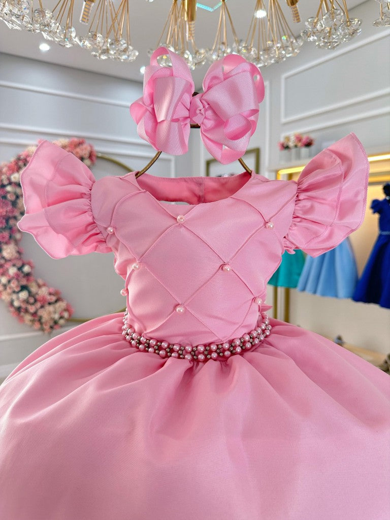 Vestido infantil rosa claro con busto acanalado y perlas