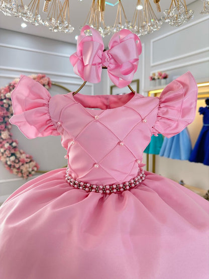 Vestido infantil rosa claro con busto acanalado y perlas