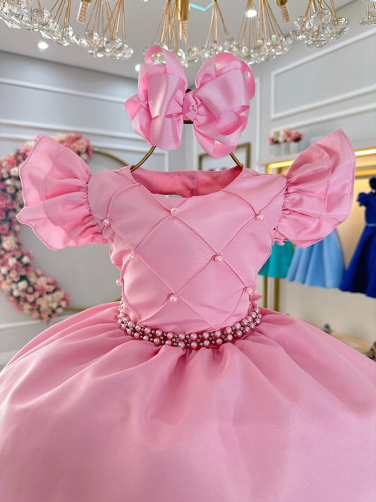 Vestido infantil rosa claro con busto acanalado y perlas