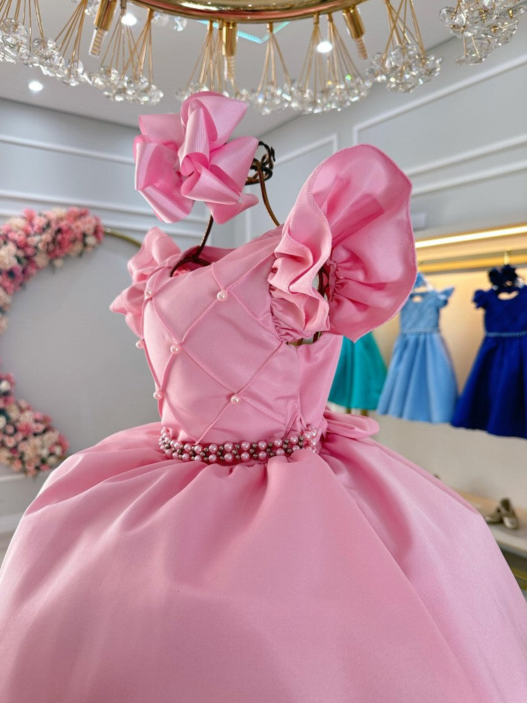 Vestido infantil rosa claro con busto acanalado y perlas