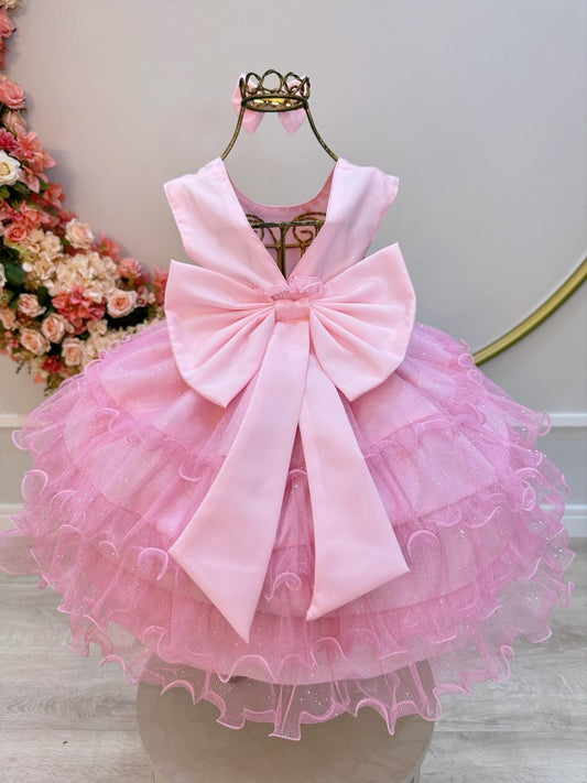 Vestido infantil rosa claro con volantes y falda brillante