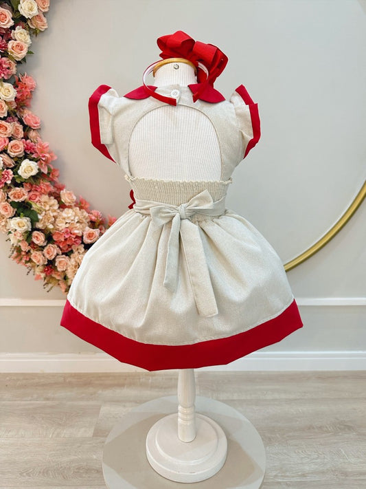 Vestido infantil color marfil con cuello Gôde y broche de lujo