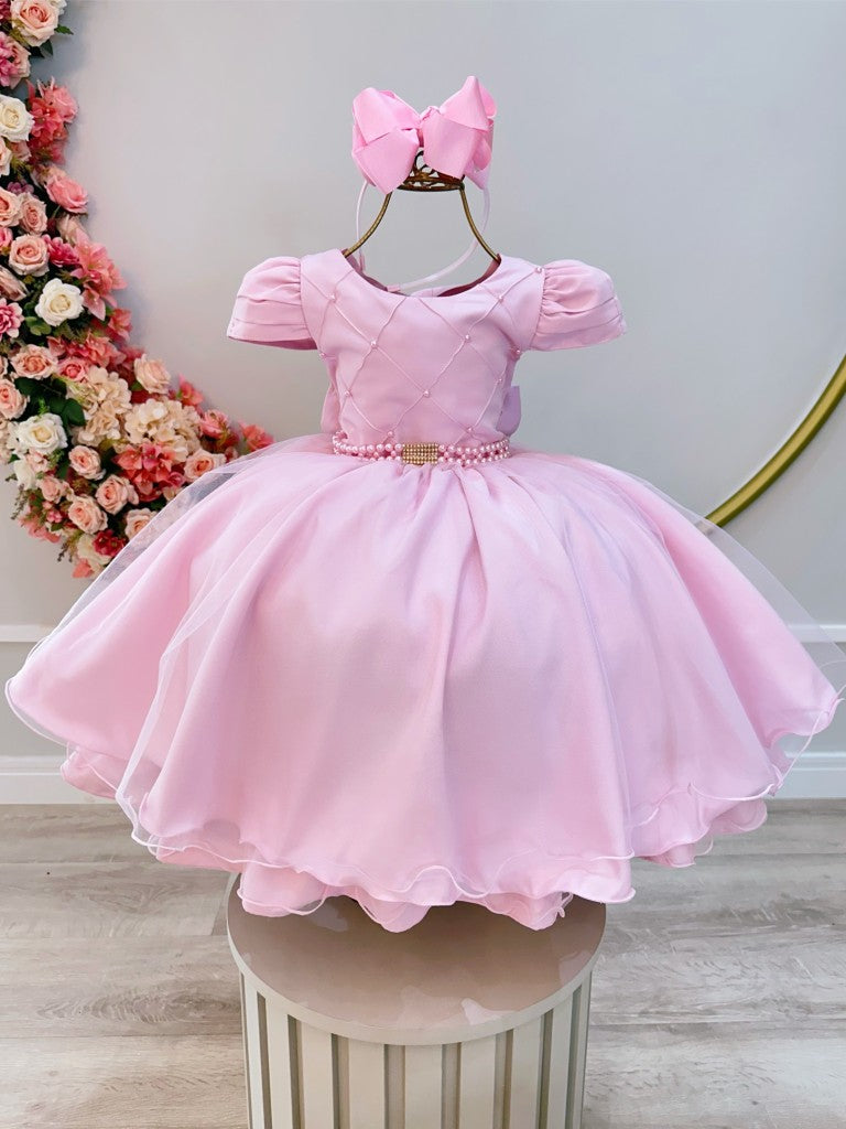 Vestido infantil rosa claro con busto acanalado para fiestas de damas