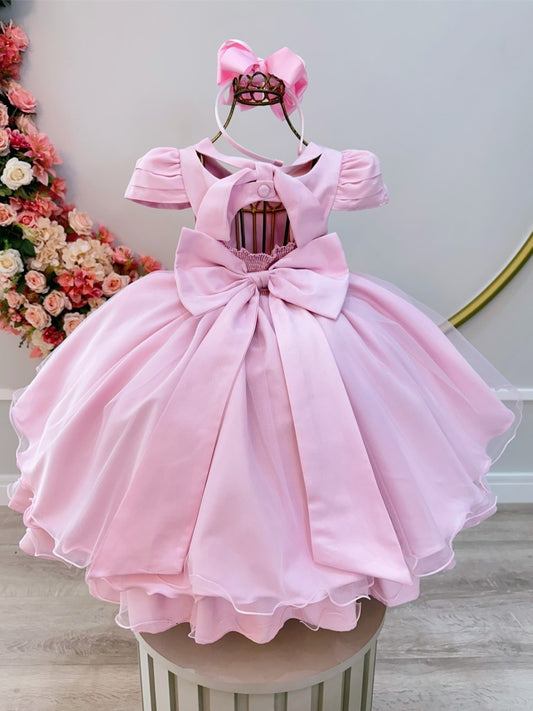 Vestido infantil rosa claro con busto acanalado para fiestas de damas