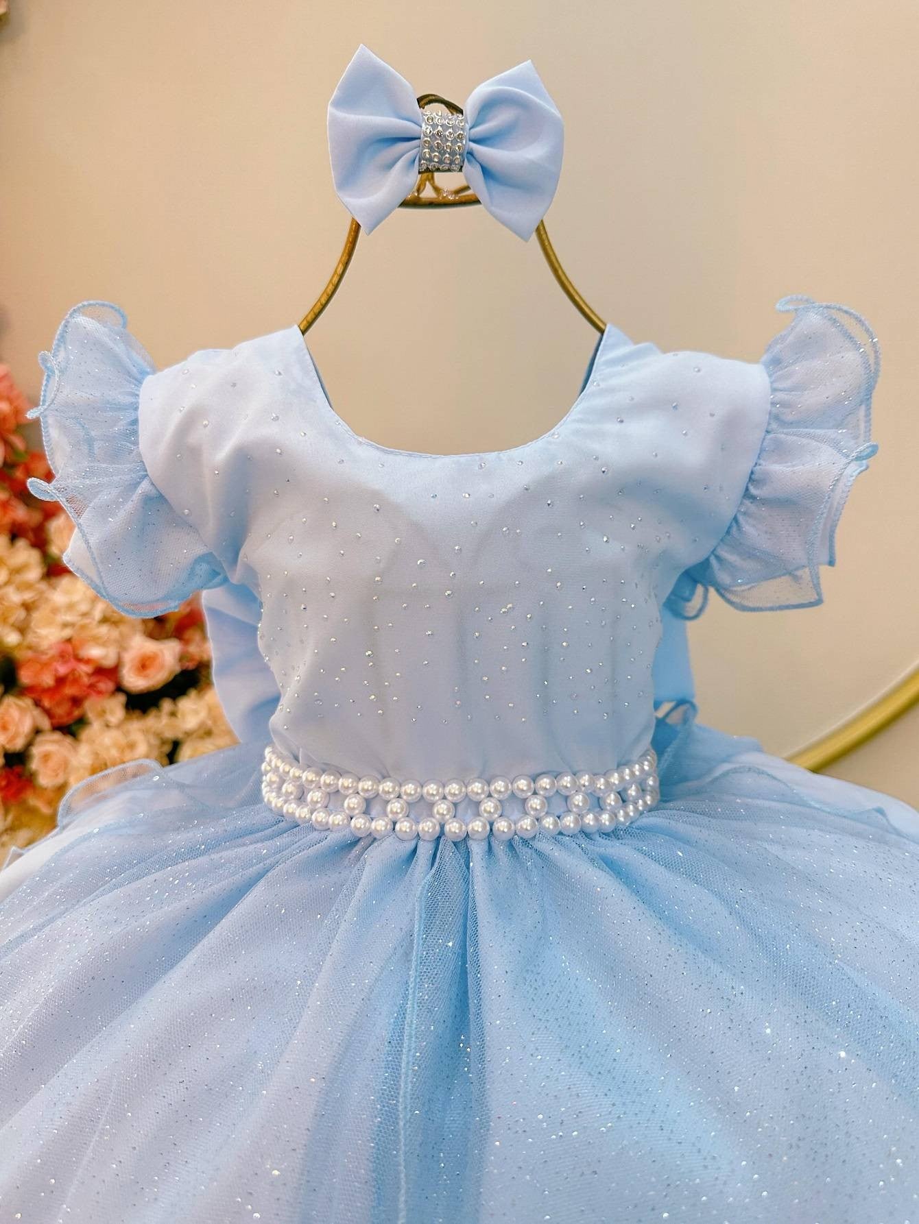 Vestido infantil azul claro con falda de tul y purpurina