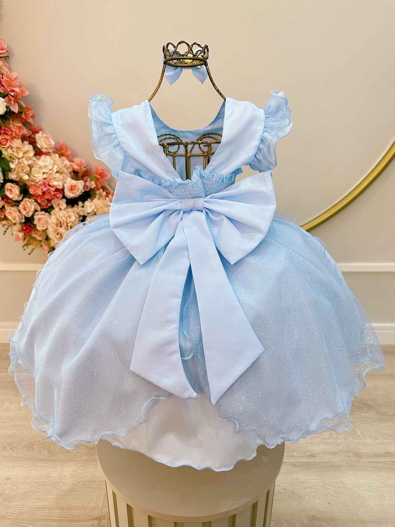 Vestido infantil azul claro con falda de tul y purpurina