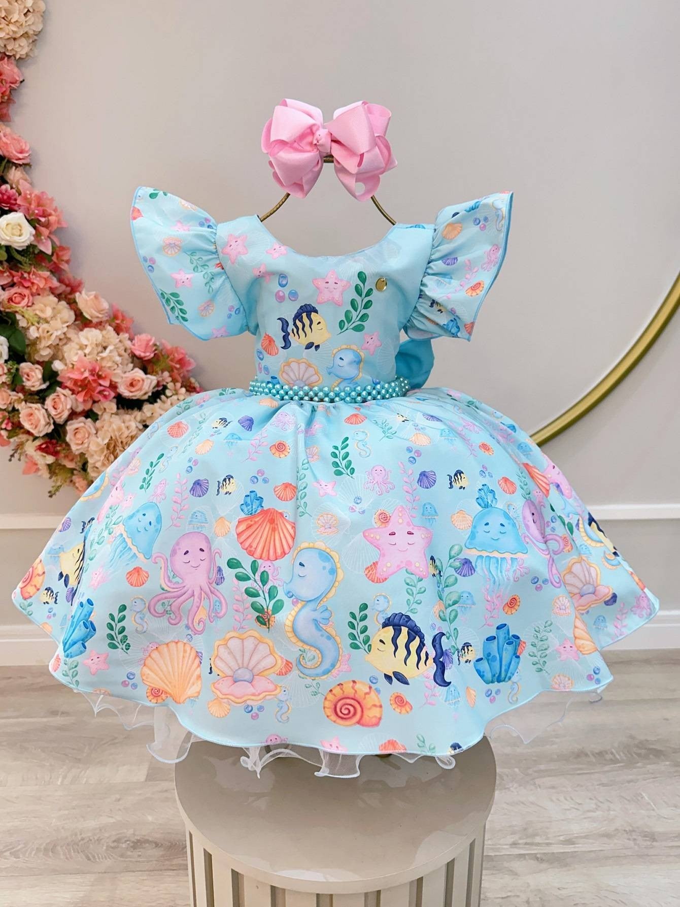 Vestido infantil verde marino con perlas