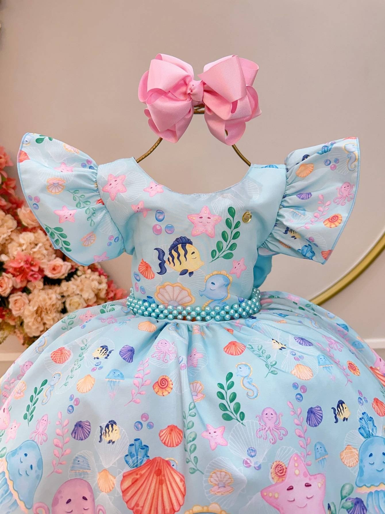 Vestido infantil verde marino con perlas