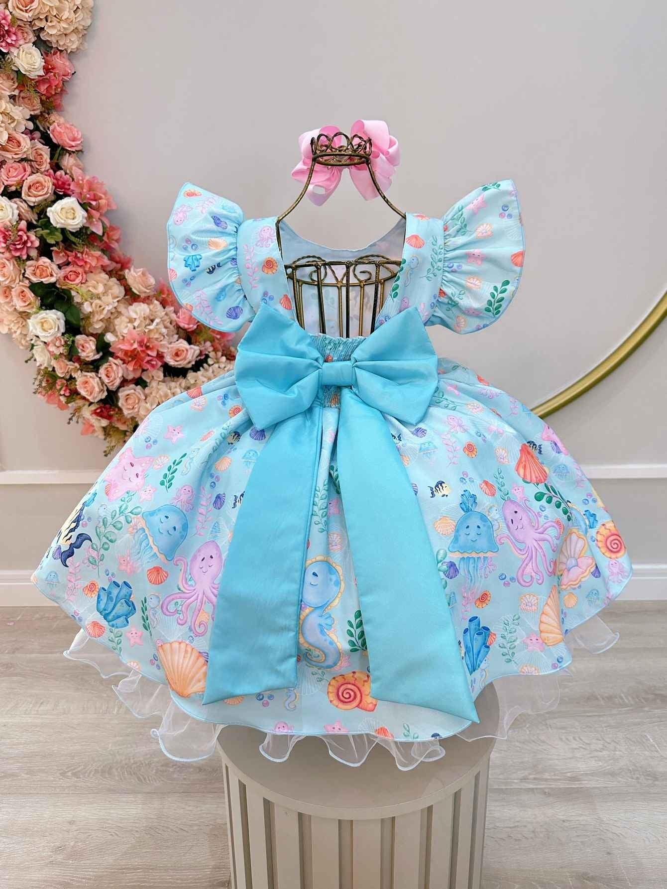 Vestido infantil verde marino con perlas