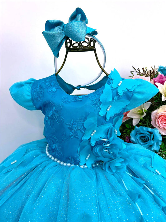 Vestido infantil verde con apliques de encaje y mariposas y flores