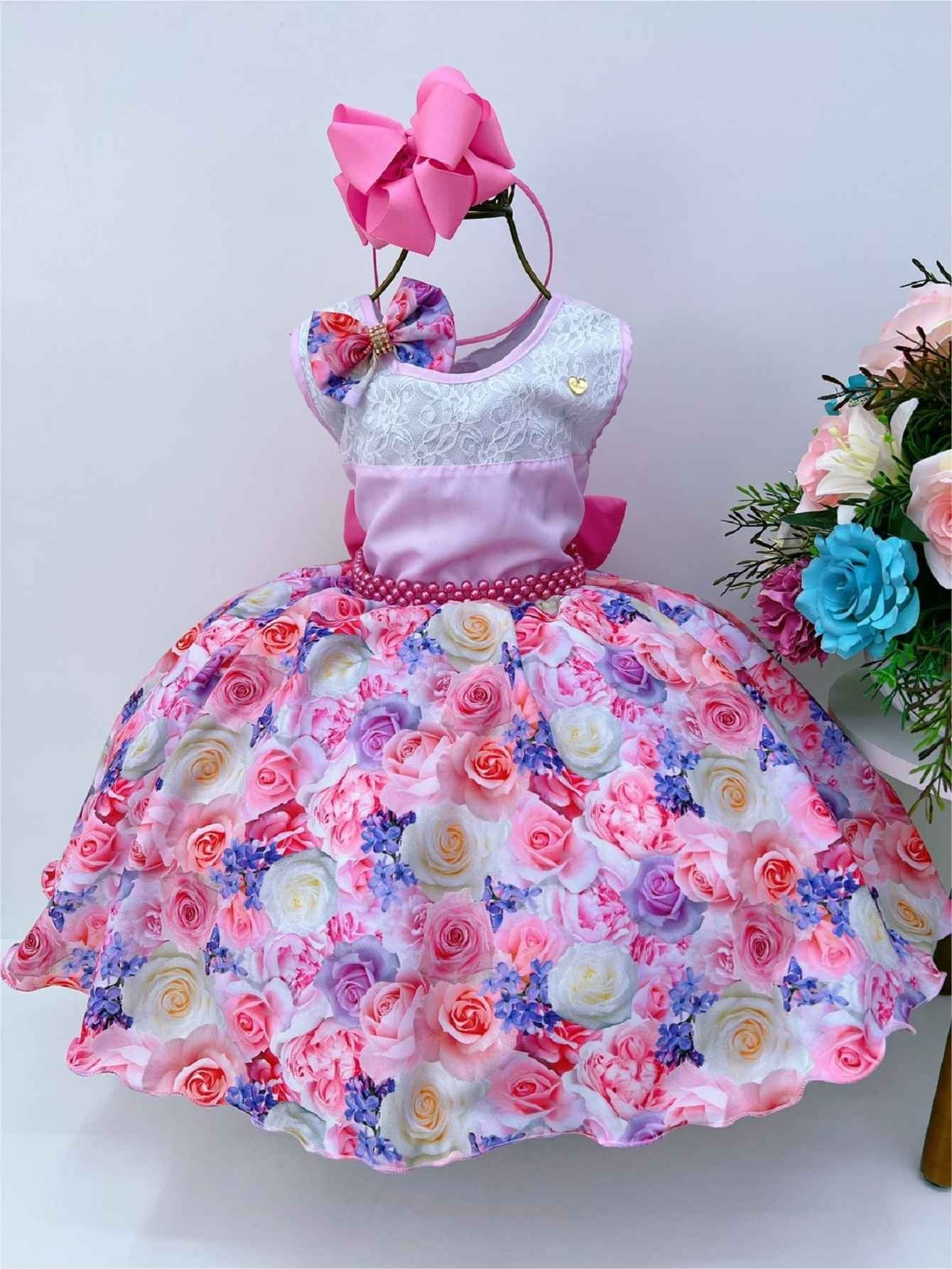Vestido infantil con estampado floral rosa, lazo y cinturón de perlas de lujo