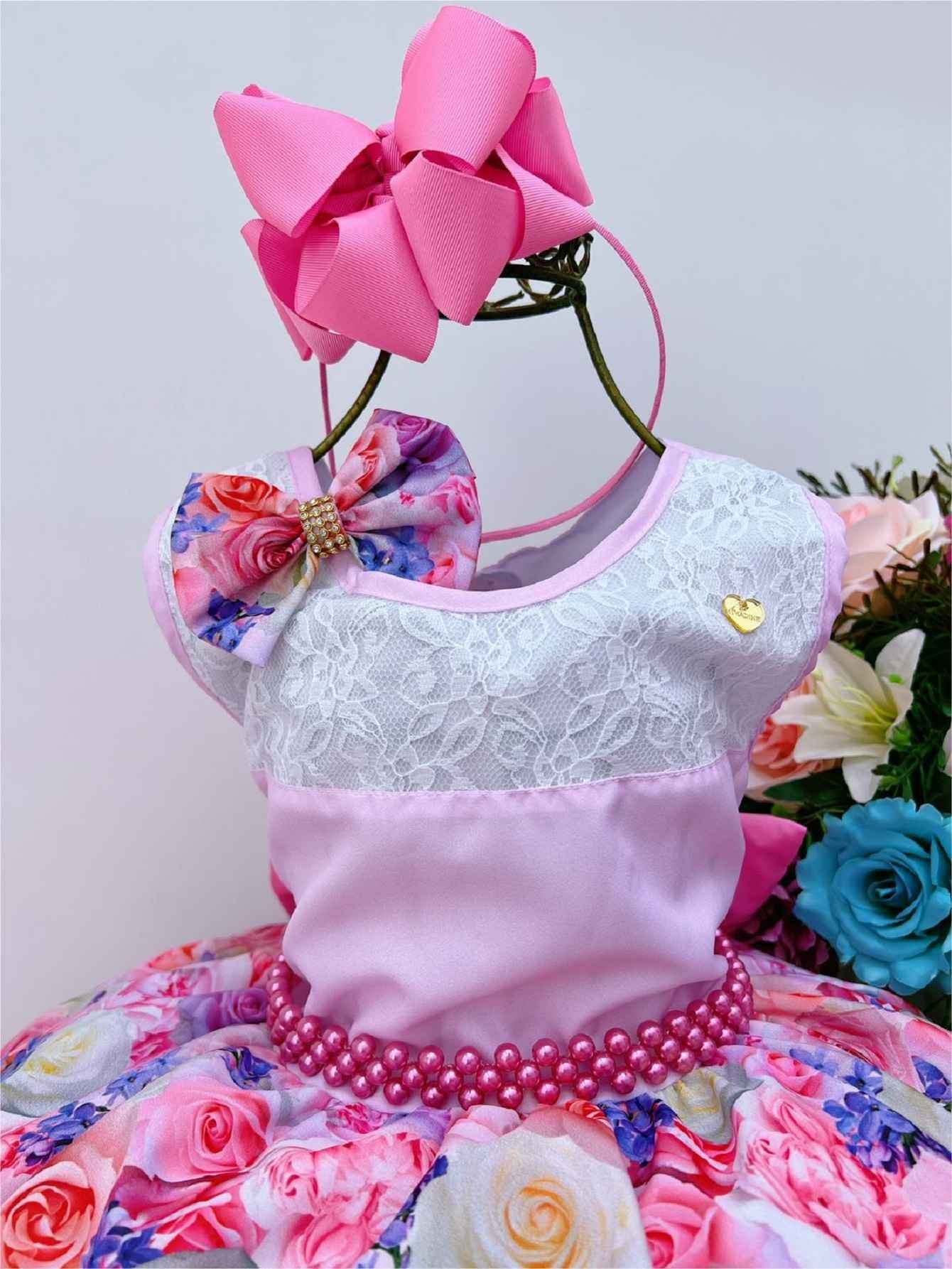 Vestido infantil con estampado floral rosa, lazo y cinturón de perlas de lujo