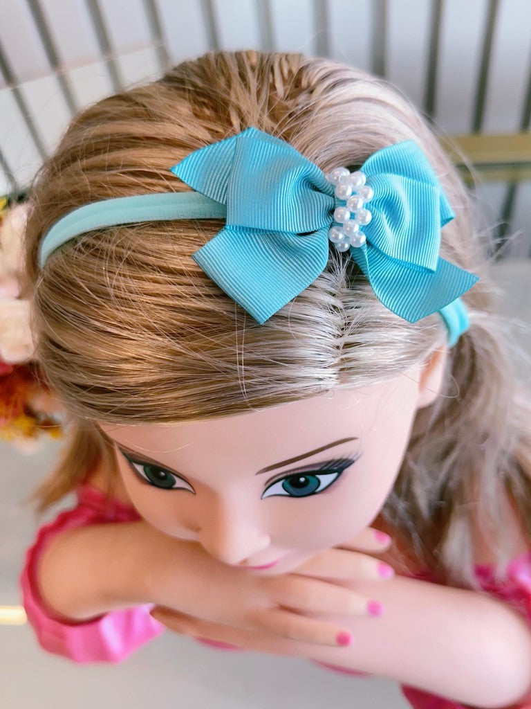 Diadema para bebé con lindas perlas en varios colores 