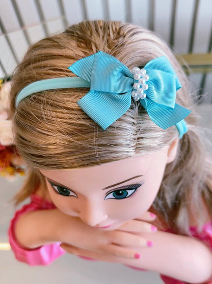 Diadema para bebé con lindas perlas en varios colores 