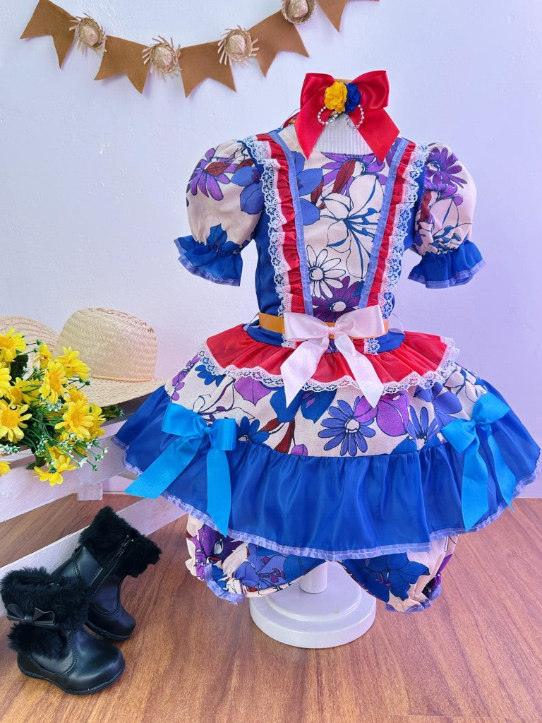 Disfraz infantil de junio con flores de colores azules y rojas 